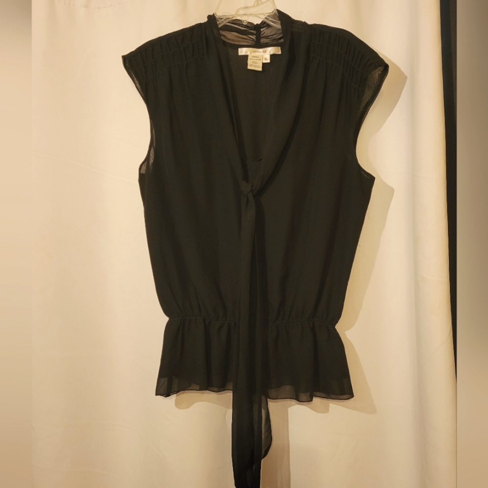 Black smocked peplum top